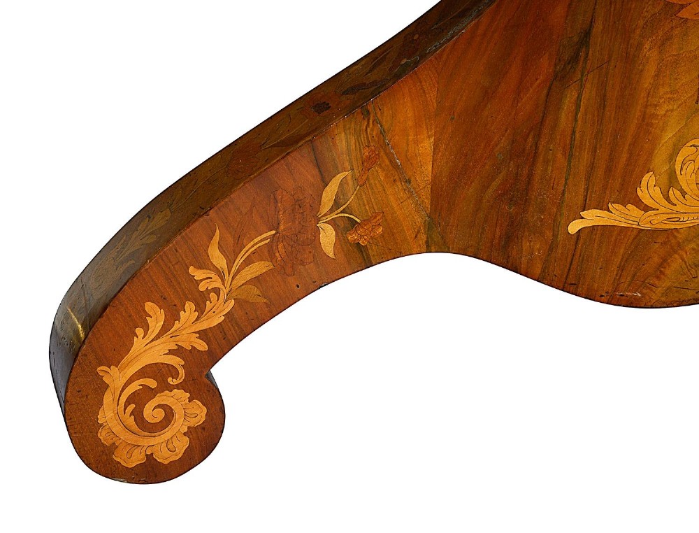 A circular Victorian walnut centre table featuring radial segment veneers, intricate floral marquetry, and a carved pedestal base with scroll feet. View IX