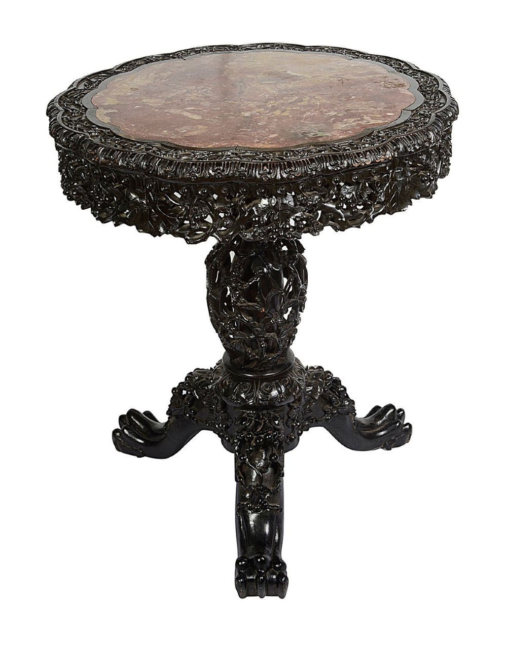 A nineteenth-century Chinese carved dark hardwood side table featuring a circular pink marble inset top, pierced openwork frieze, reticulated central pedestal, and tripod clawed feet.
