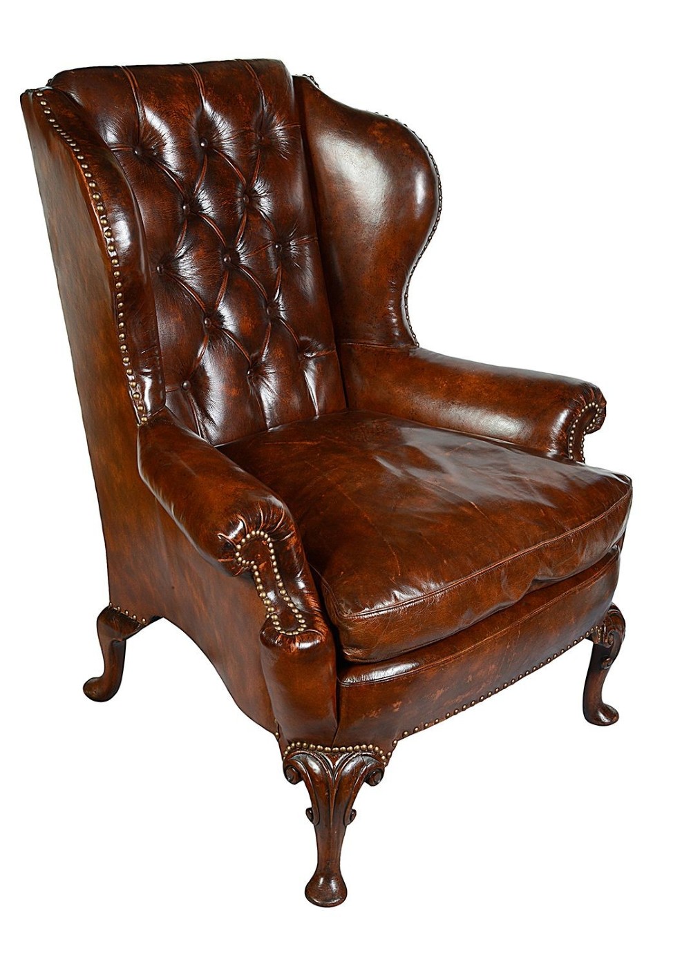 A pair of Georgian style chestnut brown leather wingback armchairs featuring deep button tufting, brass stud trimming, and carved cabriole legs. View II