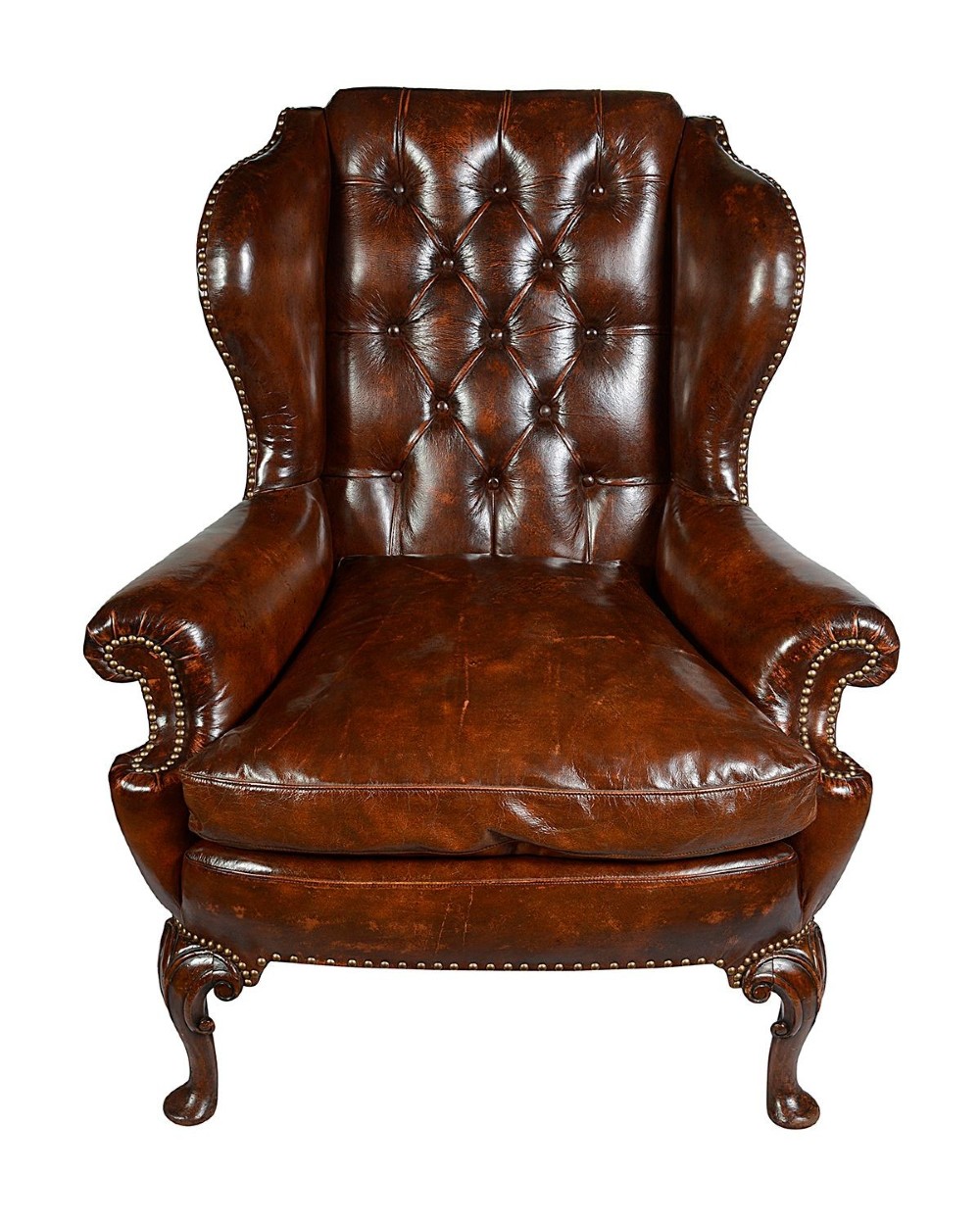 A pair of Georgian style chestnut brown leather wingback armchairs featuring deep button tufting, brass stud trimming, and carved cabriole legs. View III