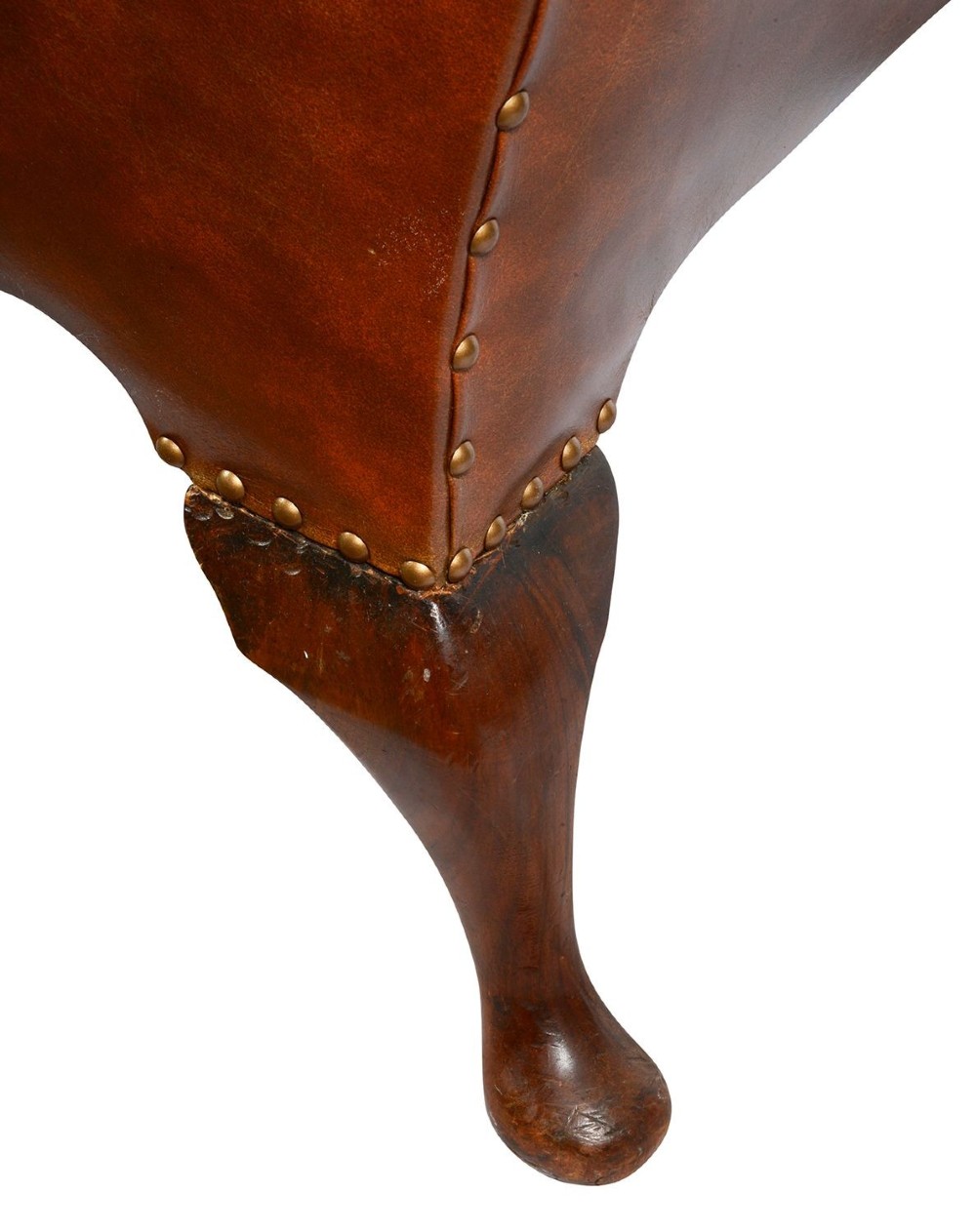 A pair of Georgian style chestnut brown leather wingback armchairs featuring deep button tufting, brass stud trimming, and carved cabriole legs. View VIII