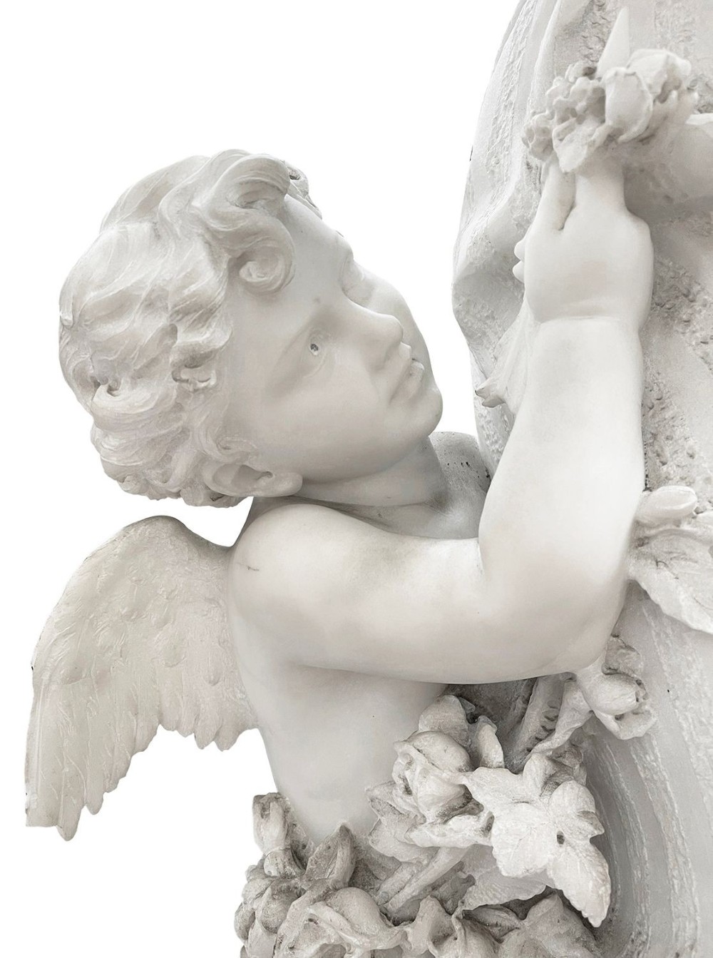 A 19th-century white Carrara marble statue depicting a classical female figure in draped robes with a winged putto at her side. View IV