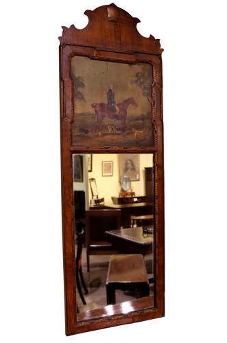 An early 20th-century Queen Anne Revival walnut pier glass mirror featuring a shaped cresting, an upper equestrian oil painting panel, and a tall mirrored pane below. View II