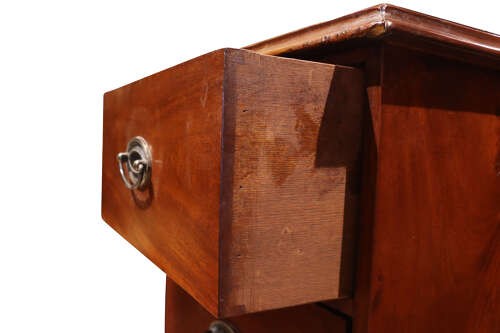 A pair of Victorian mahogany bedside chests featuring three drawers each, brass oval handles, and shaped bracket feet. View IX