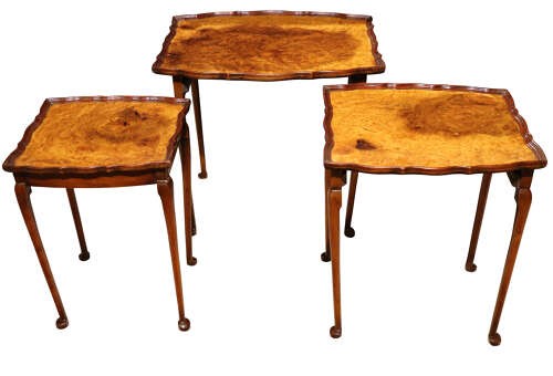 A set of three nested 1920s burr walnut side tables featuring shaped piecrust tops and slender cabriole legs. View III