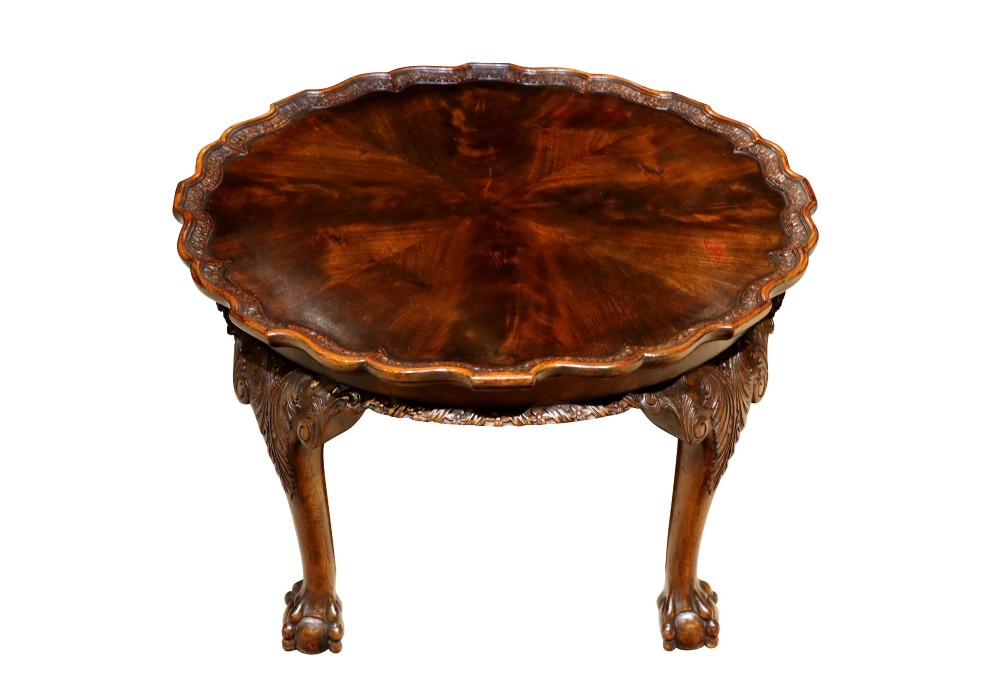 A low circular burr walnut occasional table featuring a scalloped piecrust rim, carved cabriole legs, and ball-and-claw feet. View III