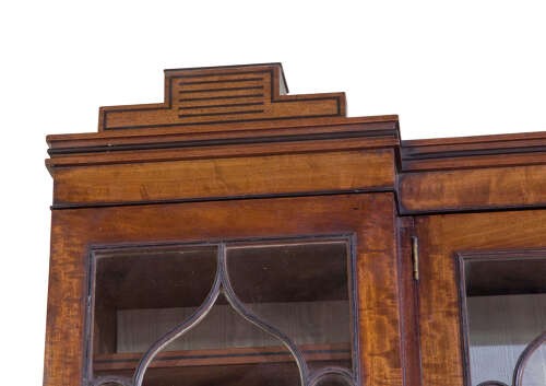 A Regency mahogany breakfront secretaire bookcase with glazed doors, satinwood veneers, and ebony inlay detail. View XII