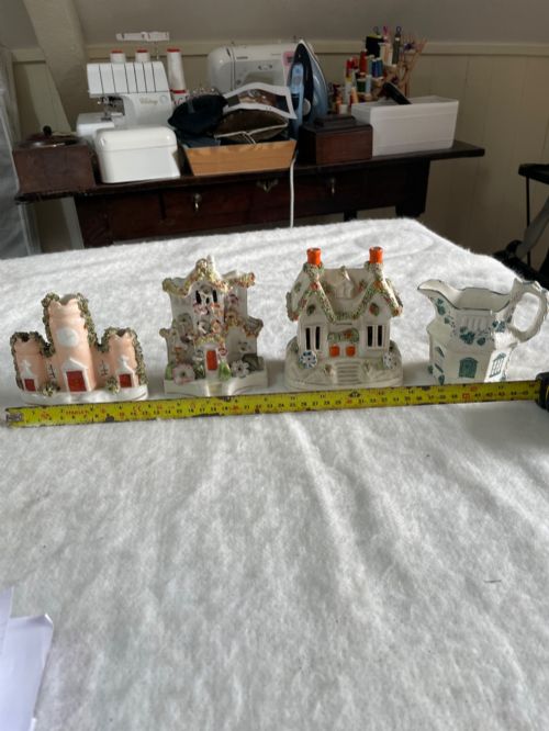 Mixture of Rockingham and Staffordshire Cottages , Castle , and Jug .