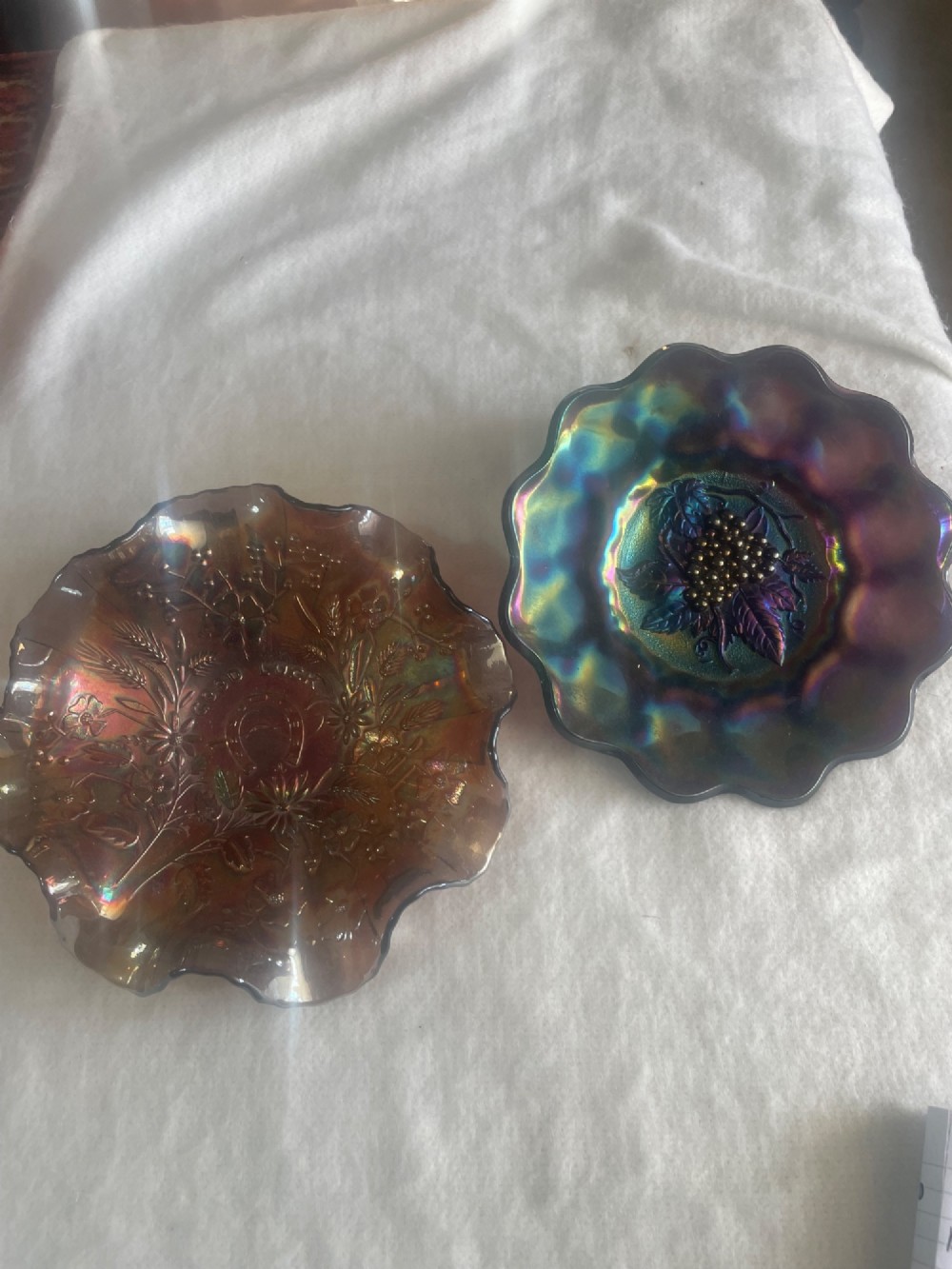 2 pieces of dark carnival glass .
