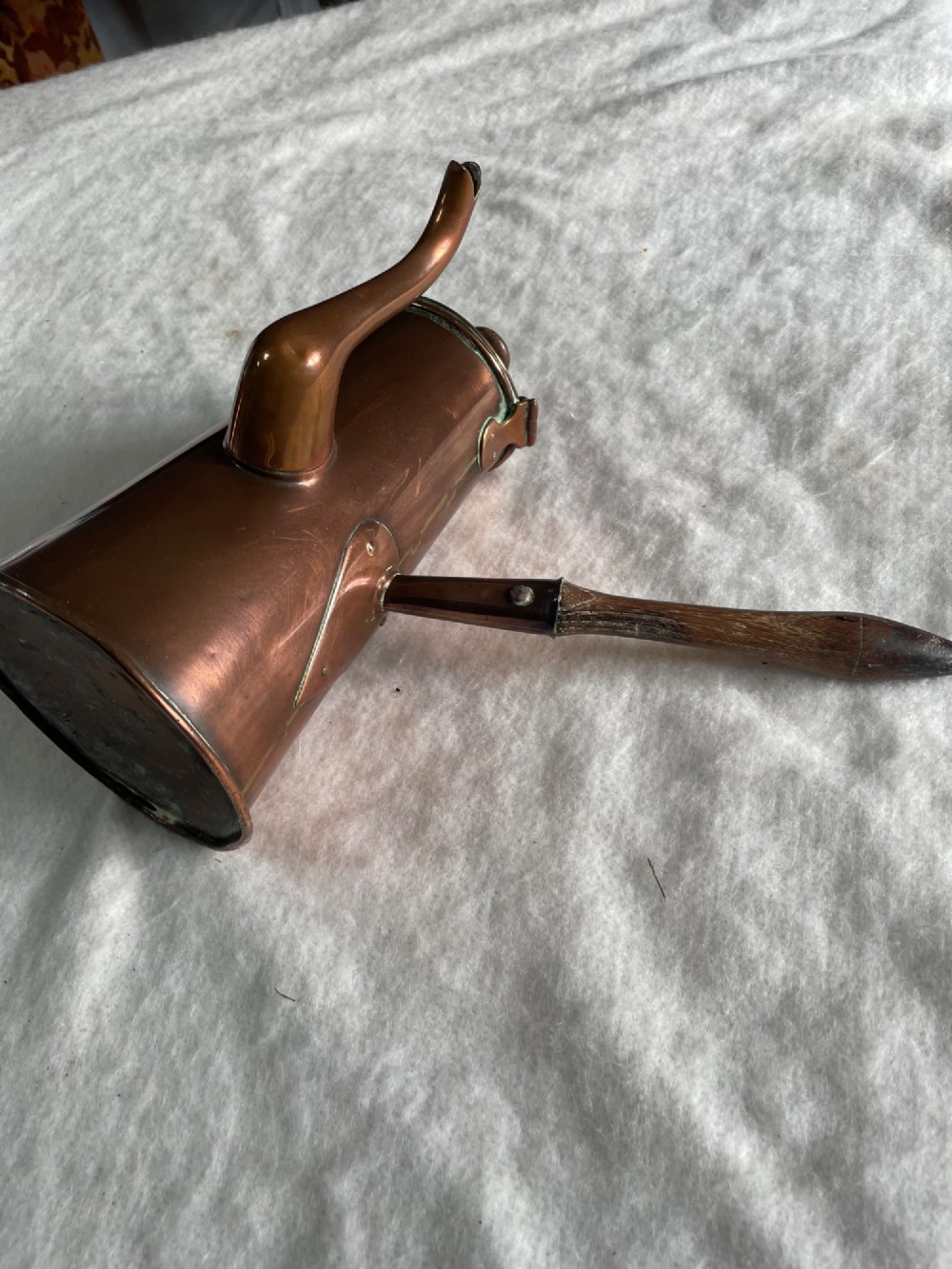 An antique tapered copper chocolate pot featuring a side-mounted turned wooden handle, a curved spout, and visible dovetail joinery. View III