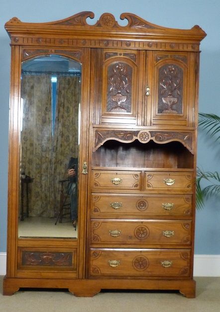 fig 1. Edwardian carved walnut compactum wardrobe.