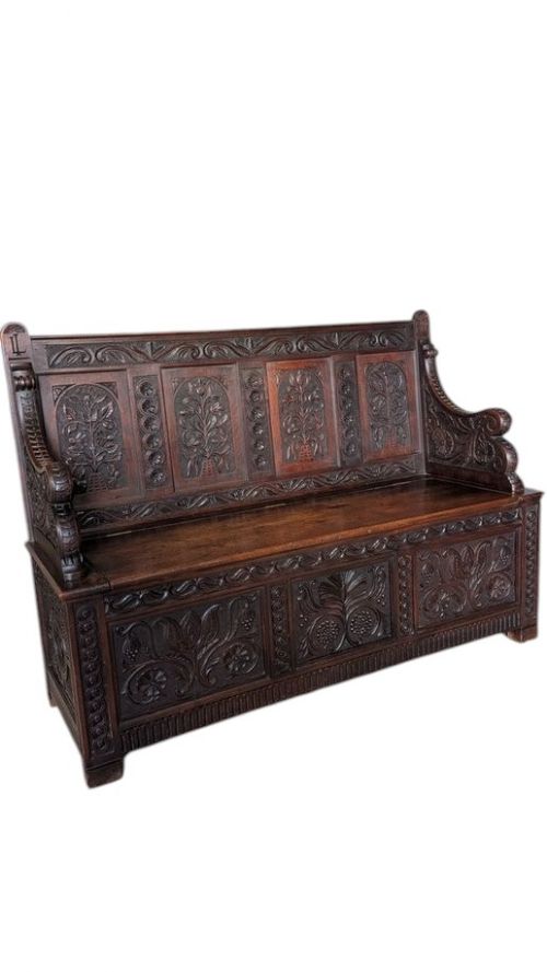 A Late 19th Century Carved Settle