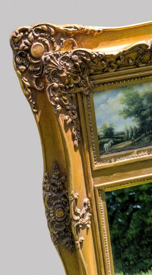 A GILT FRAMED WALL PIER MIRROR - ADDITIONAL PHOTO 1