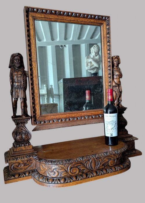 AN IMPRESSIVE CARVED OAK DRESSING MIRROR - ADDITIONAL PHOTO 1