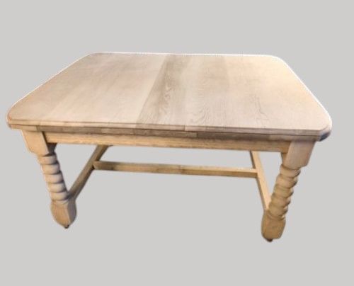 fig 1. A late Victorian low bleached oak table featuring turned bobbin legs, a rectangular top with rounded corners, and a perimeter stretcher base.