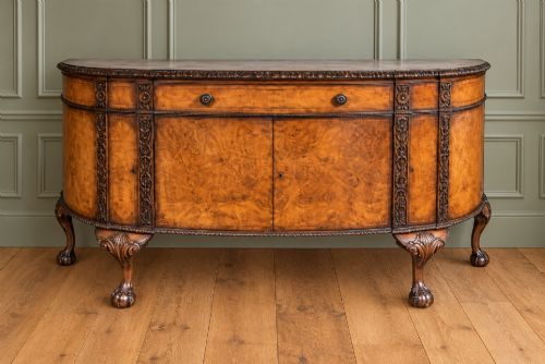 A Burr Walnut Sideboard with Twelve Piece Cutlery Set