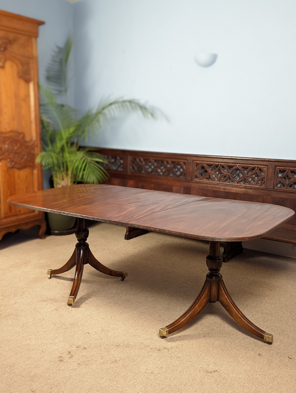 A Regency style mahogany double pedestal dining table. View II