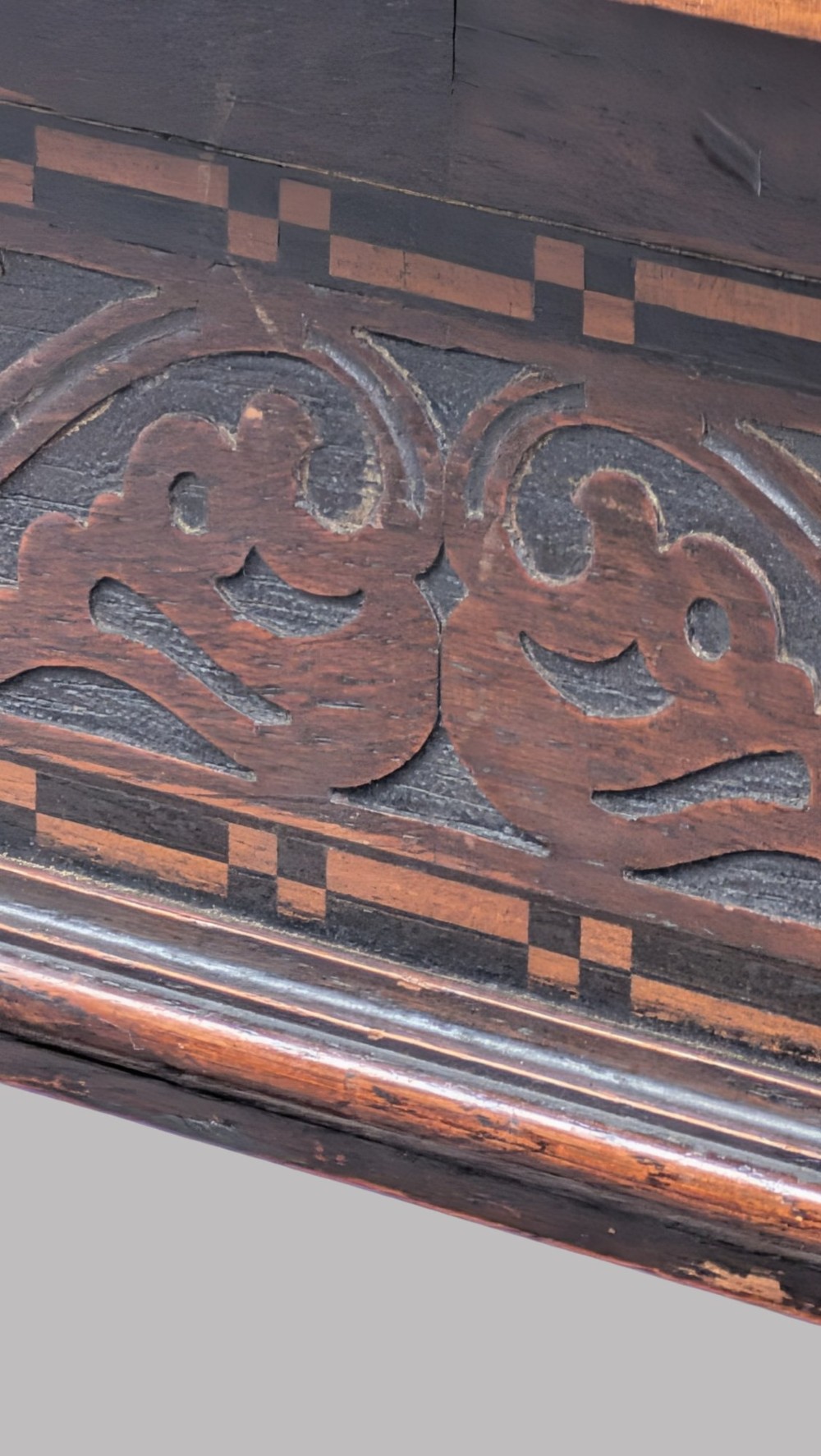 A rectangular extending oak dining table showing a quarter-sawn timber surface and carved bulbous legs underneath. View VI