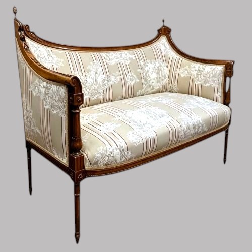 An Edwardian Walnut Drawing Room Sofa