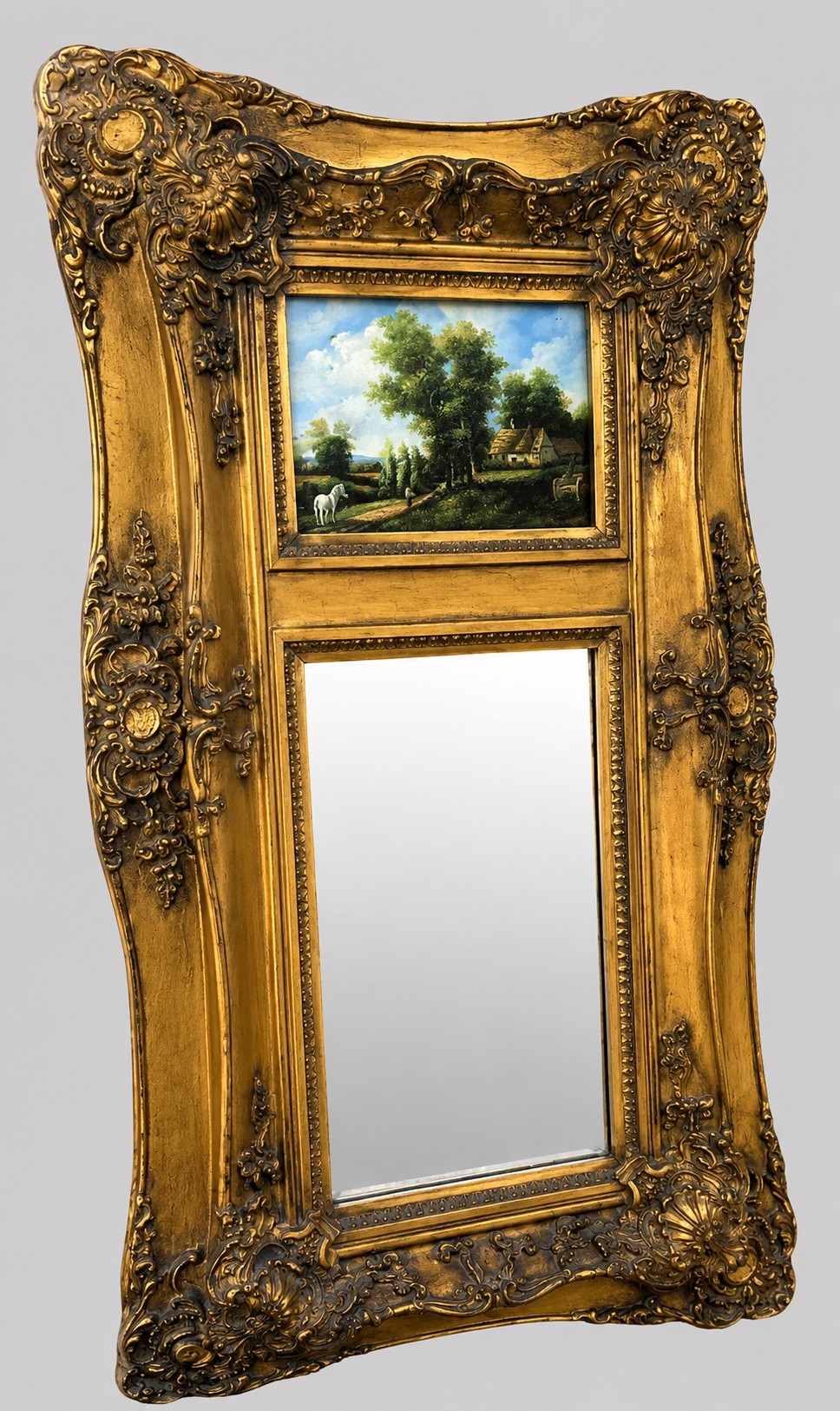 An elongated vertical giltwood pier mirror featuring an upper painted landscape panel above a rectangular glass mirror, set within a carved rococo-style frame. View IX