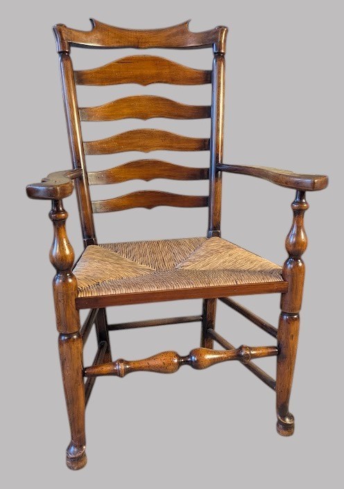 A set of eight dark wood ladderback dining chairs with hand-woven rush seats, including two armchairs and six side chairs. View XIII