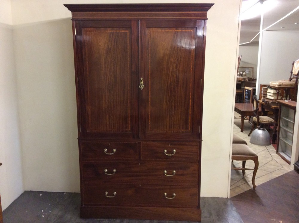Fine mahogany inlaid press cupboard