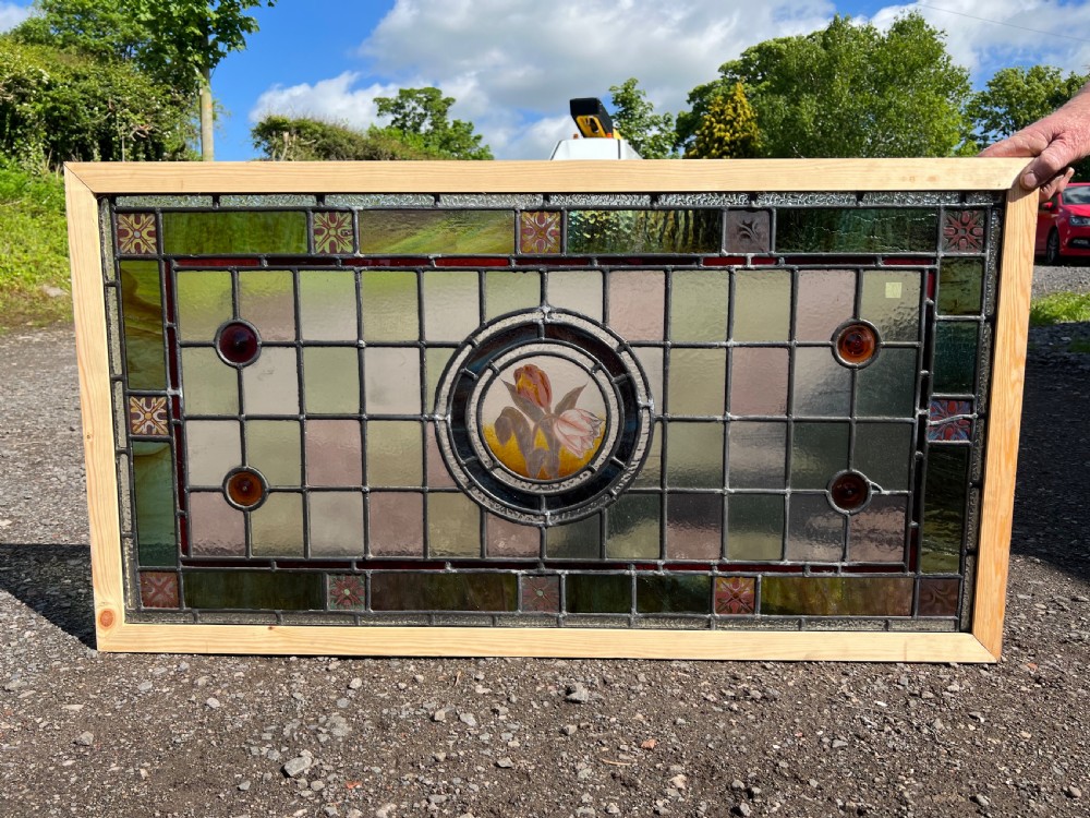 a large painted and leaded glass window