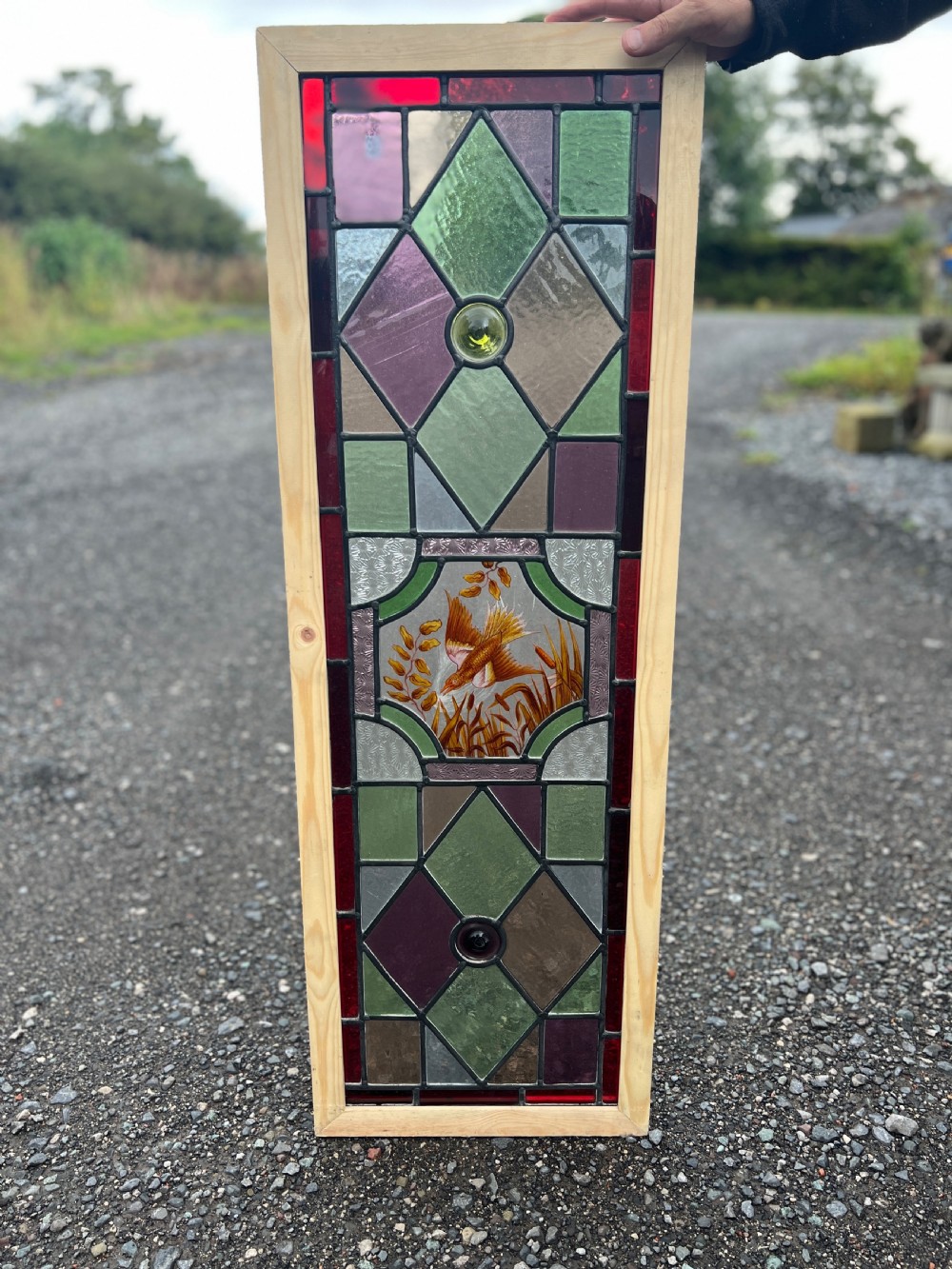 stained glass window - depicting a bird