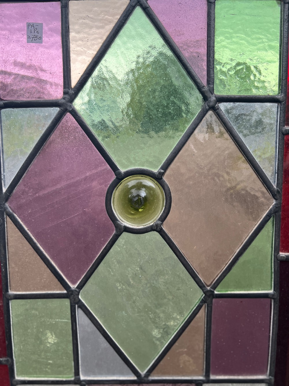 stained glass window - depicting a bird View IV