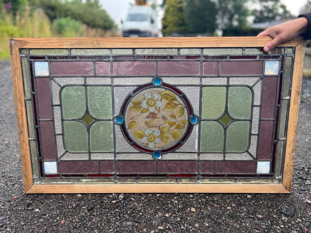 Stained glass window - with birds and flowers