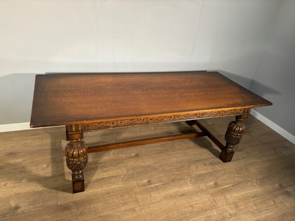 A good Jacobean revival carved oak refectory table  View II