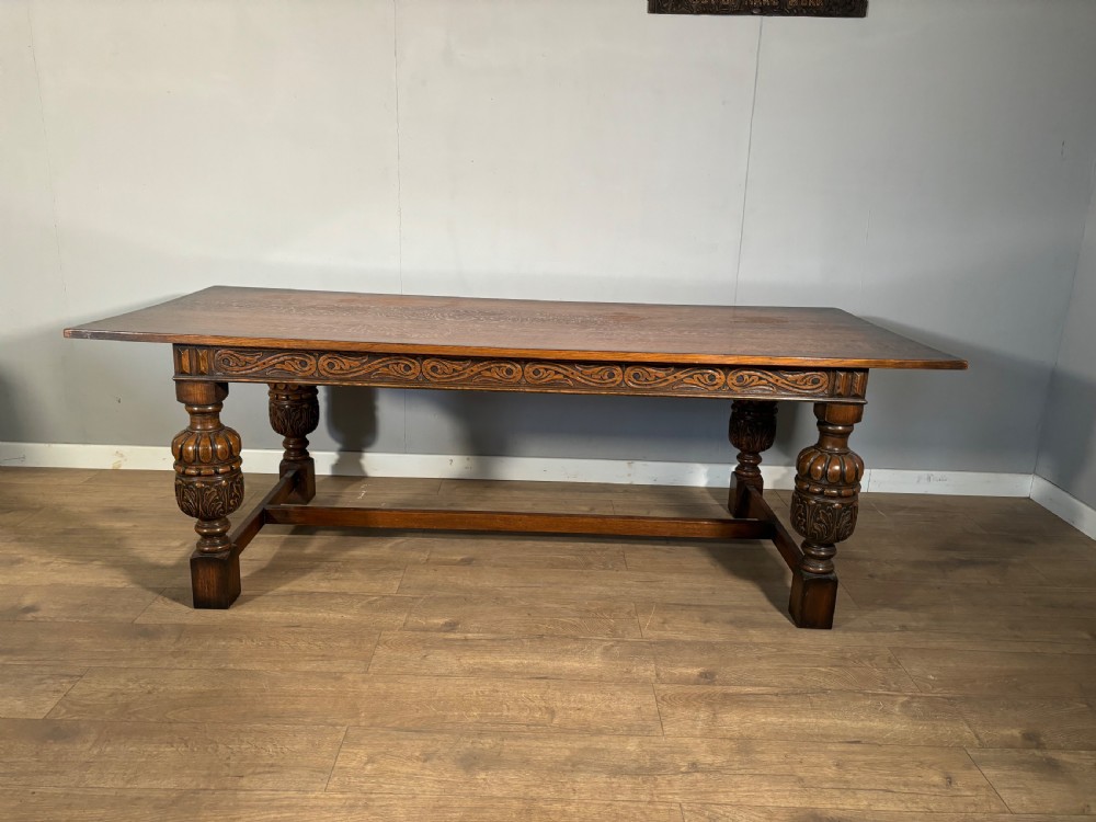 A good Jacobean revival carved oak refectory table  View III