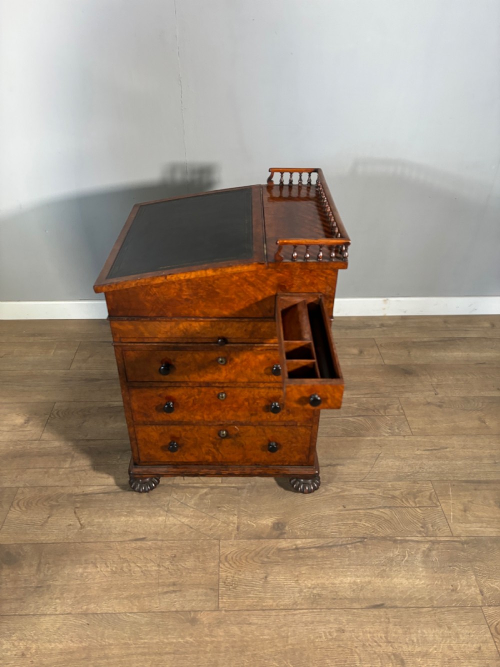 An exceptional Gillows regency davenport in pollard oak  View IX
