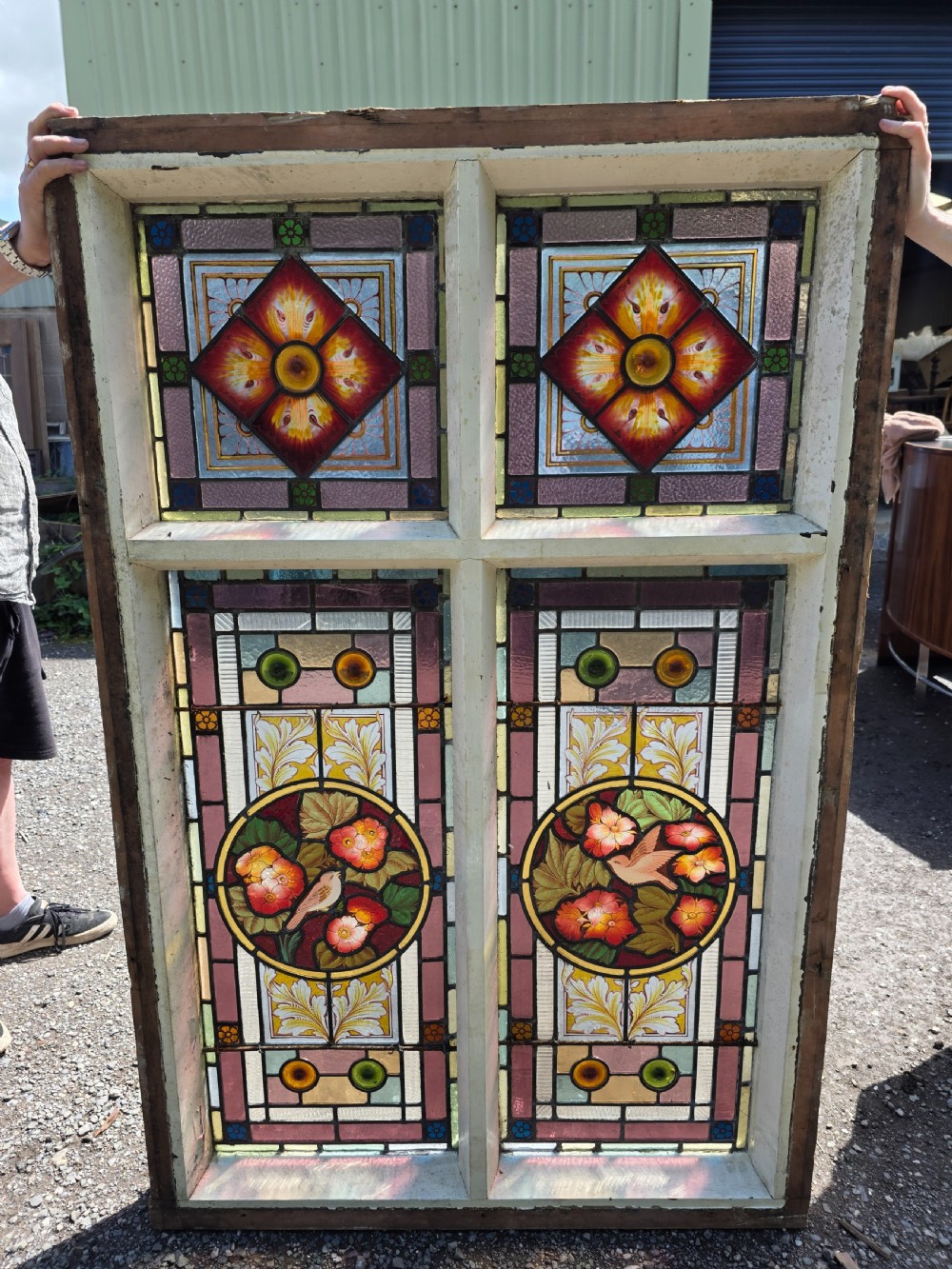 1880 antique leaded glass window with amber and green bullseyes and birds on flowers design  View VI