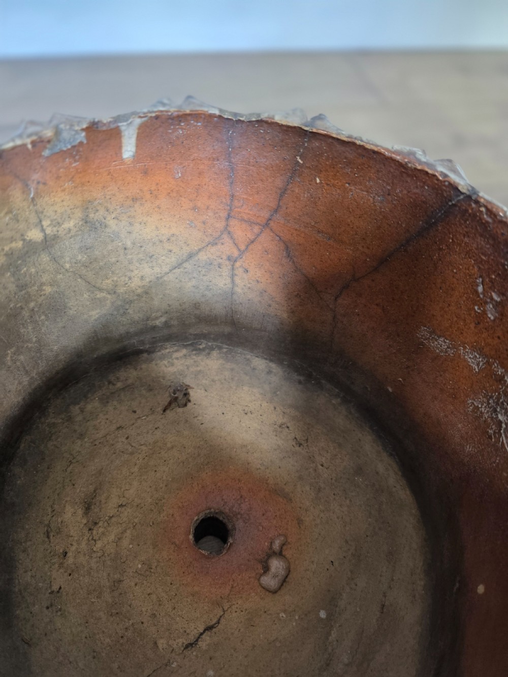 A 19th-century brown glazed ceramic jardiniere and stand textured to resemble tree bark and interlaced log branches. View XII
