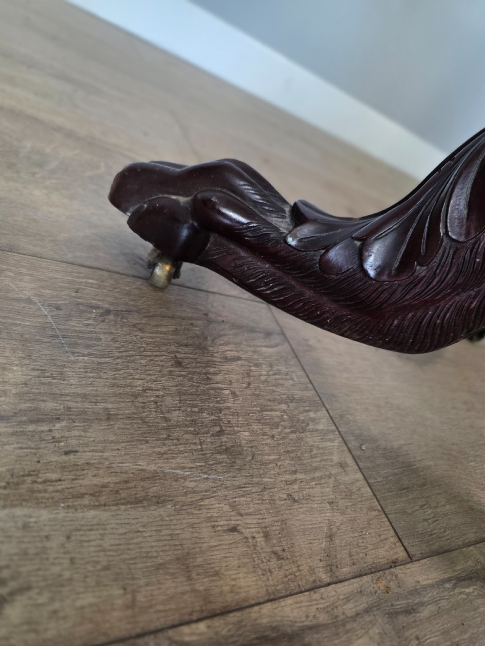 A tall mahogany gentlemans shaving stand featuring an adjustable rectangular mirror, a single drawer pedestal, a fluted column, and a carved tripod base. View XVII