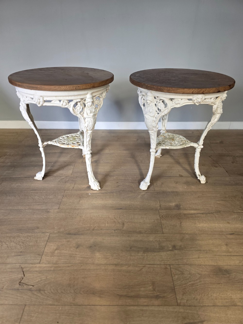 Near Pair Of Cast Iron Victorian Britannia Pub Tables with Matching Solid Oak Tops.  View III