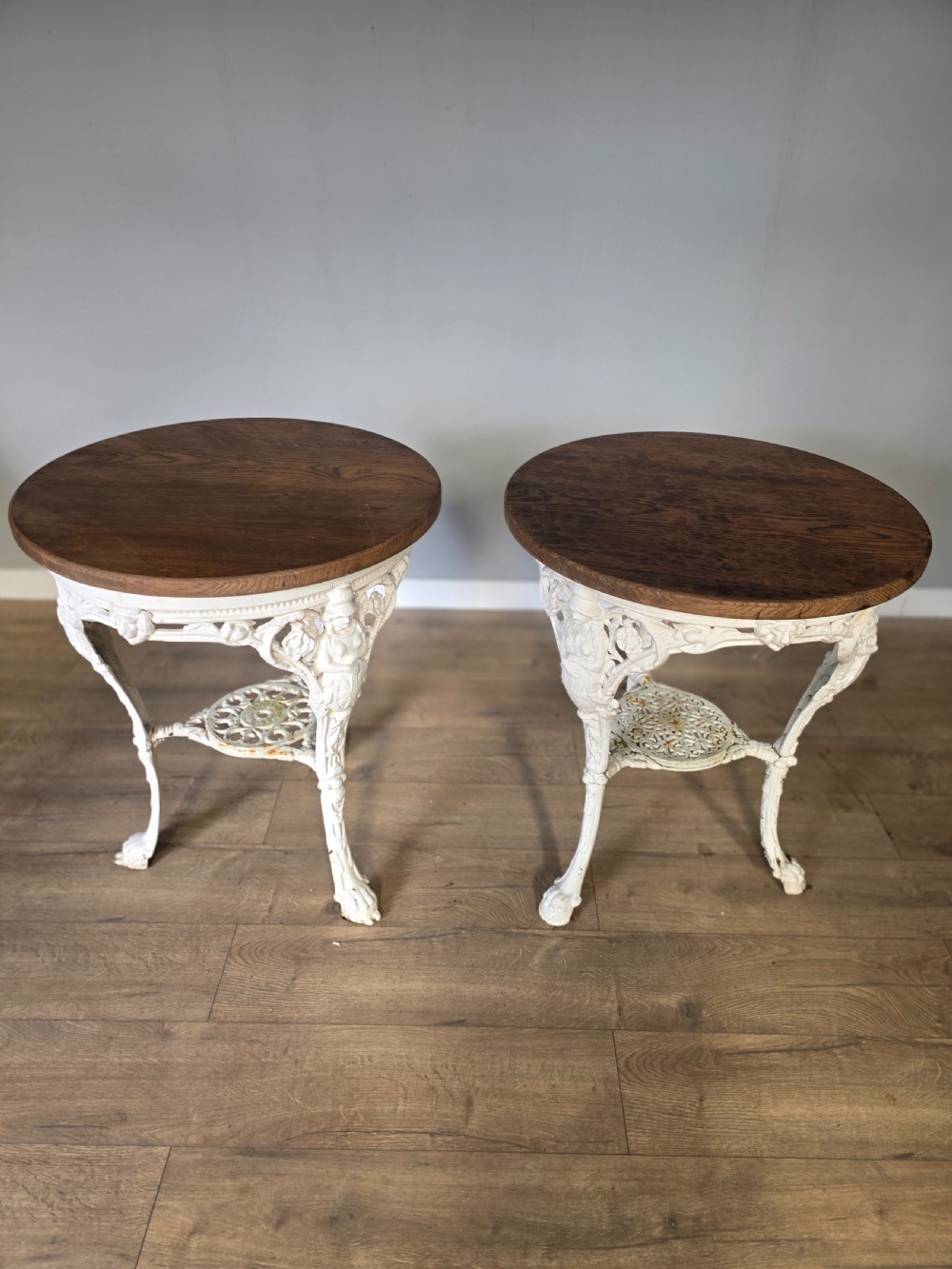 Near Pair Of Cast Iron Victorian Britannia Pub Tables with Matching Solid Oak Tops.  View IV