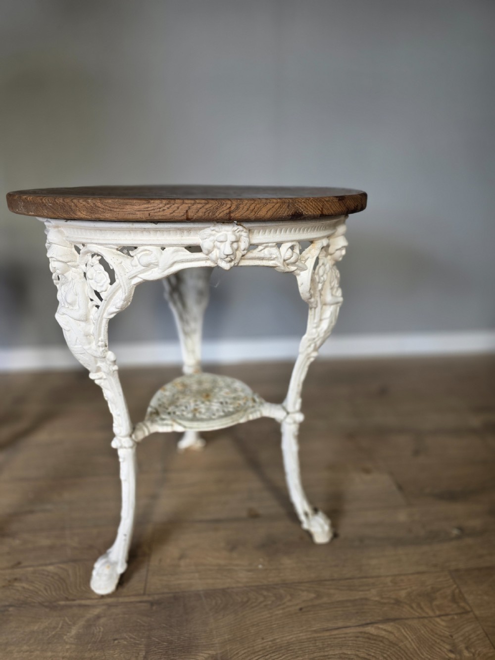Near Pair Of Cast Iron Victorian Britannia Pub Tables with Matching Solid Oak Tops.  View V