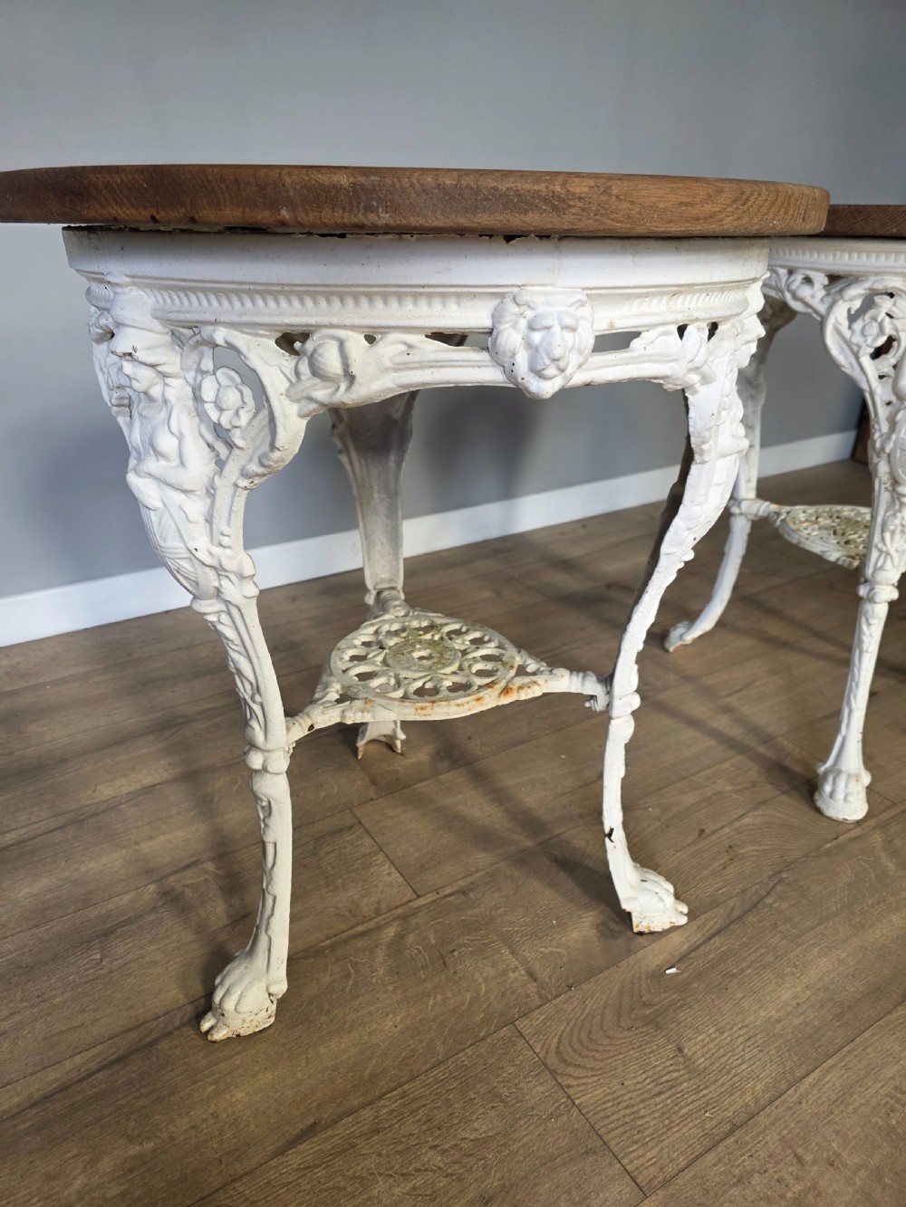 Near Pair Of Cast Iron Victorian Britannia Pub Tables with Matching Solid Oak Tops.  View IX
