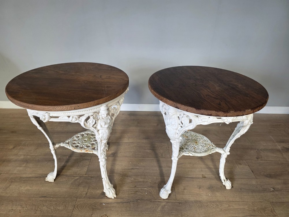 Near Pair Of Cast Iron Victorian Britannia Pub Tables with Matching Solid Oak Tops.  View XVI