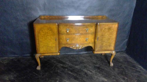 a fine quality berefords and hicks elegant  figured  burr walnut queen anne stlye sideboard on carved cabriole legs supporting a great patination