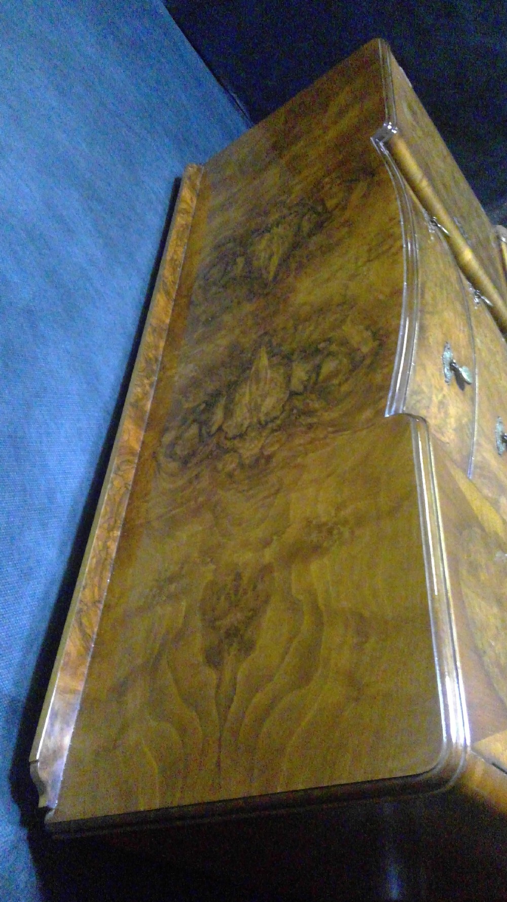 A burr walnut Queen Anne style sideboard featuring two central drawers flanked by cupboard doors, resting on carved cabriole legs with claw and ball feet. View V