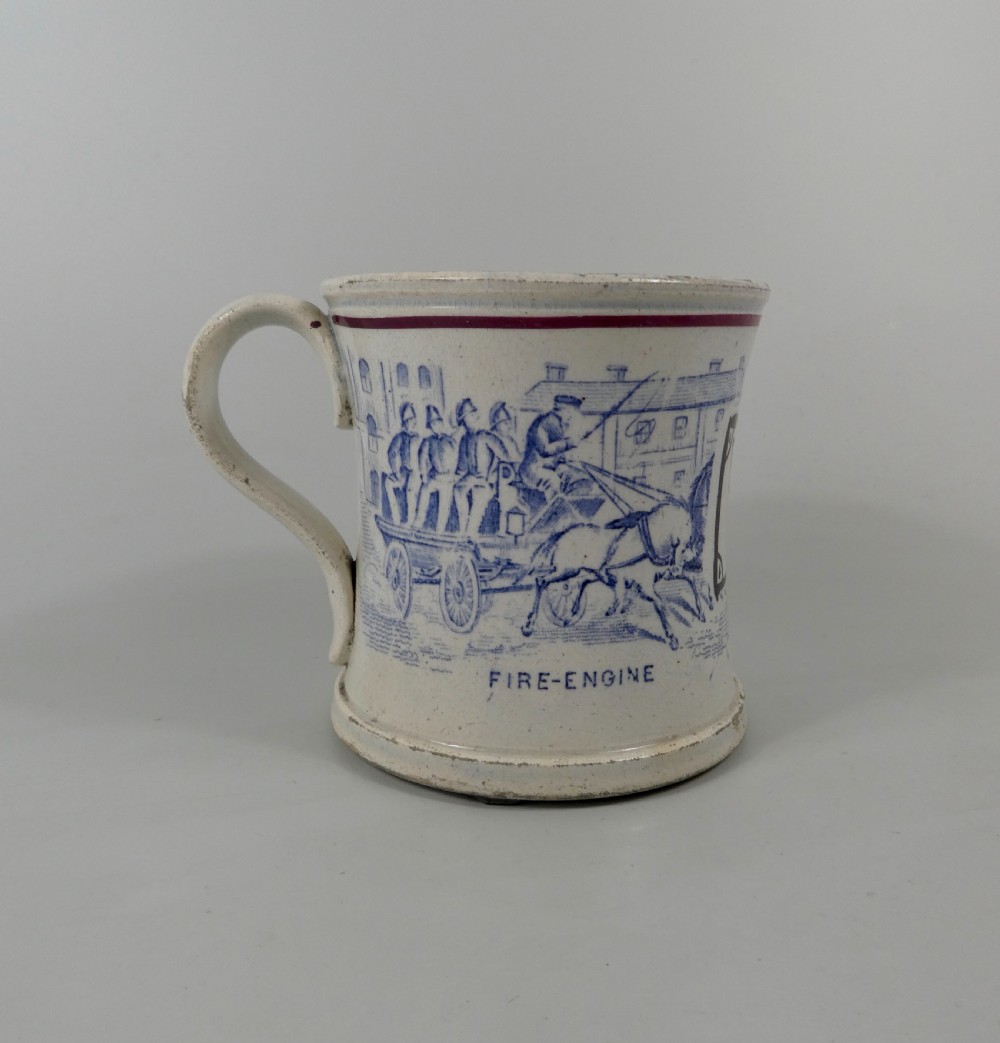 Rare English pottery mug, Fire Engine, dated 1876.