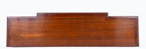 fig 1. A Georgian Revival walnut breakfront sideboard featuring three upper drawers over four cupboard doors, with central brass lattice inserts, raised on a plinth base.