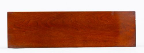 fig 1. A Victorian mahogany open bookcase featuring open adjustable shelves, a dark interior, a upper moulded border, and a low plinth base.