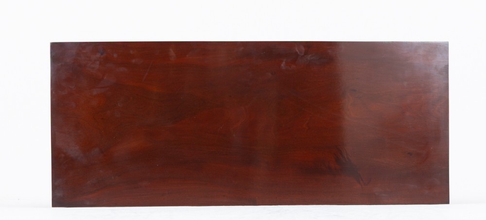 A Victorian mahogany side cabinet featuring two recessed arched panel doors and a solid plinth base. View VI