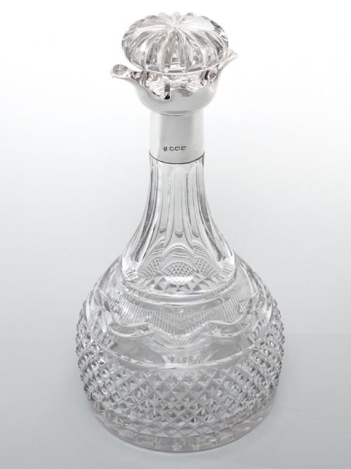 silver mounted decanter with a georgian style cut glass body - CATEGORY: ANTIQUE SILVER - DATED 1920