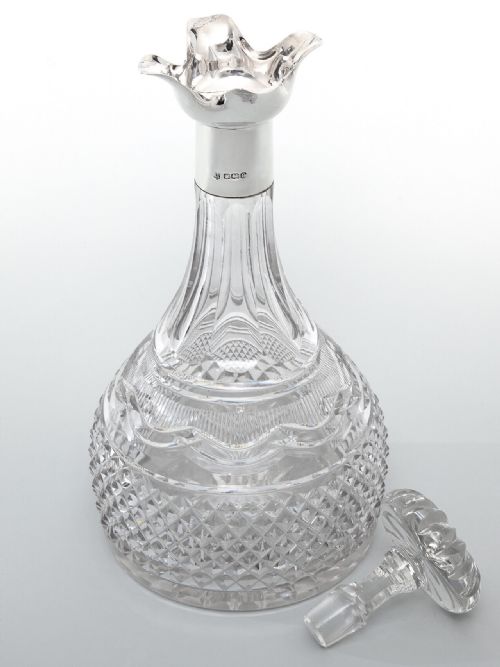 SILVER MOUNTED DECANTER WITH A GEORGIAN STYLE CUT GLASS BODY - ADDITIONAL PHOTO 1