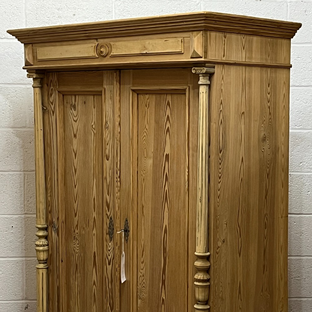 Small Old Pine 2 Door Wardrobe With Columns And Bottom Drawer View IV